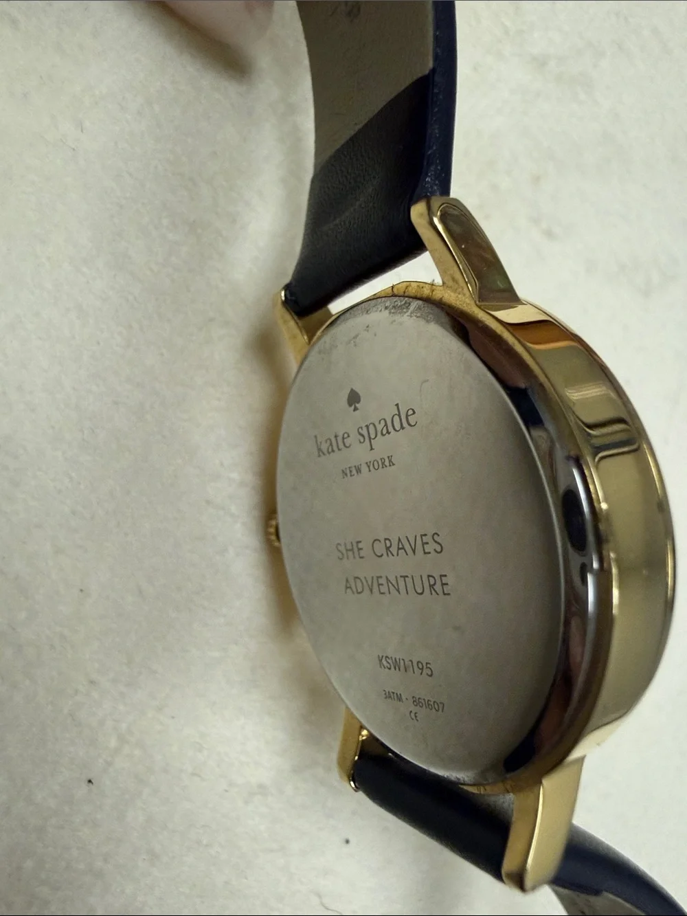kate spade Gold-Tone Sagittarius Watch with Black Strap and Mother-of-Pearl Dial